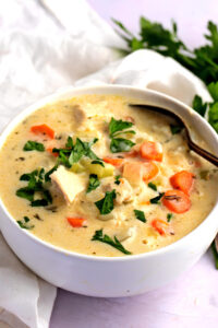 Bowl of Warm Homemade Panera Chicken and Wild Rice Soup with Vegetables