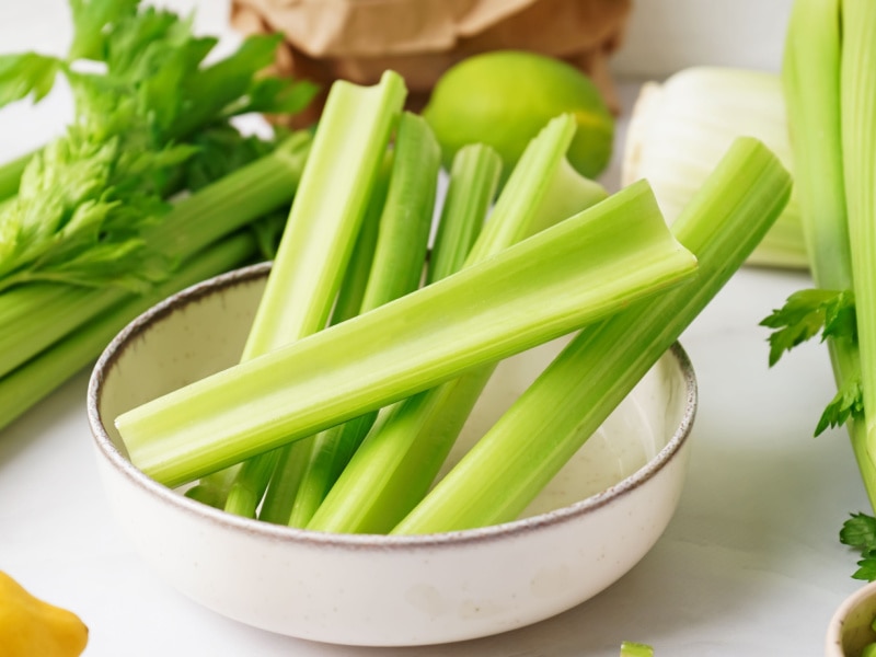 Celery Stalks on a Ceramic Saucer