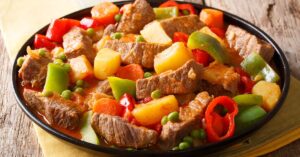 Delicious Homemade Beef Caldereta with Peppers and Potatoes