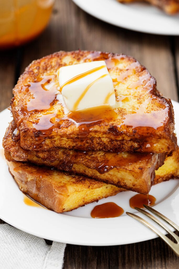 Eggnog French Toast Served on White Plate