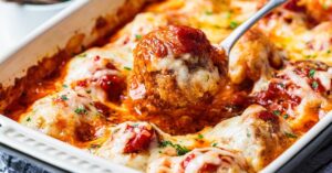 Homemade Cheesy Meatballs Casserole with Tomato Sauce