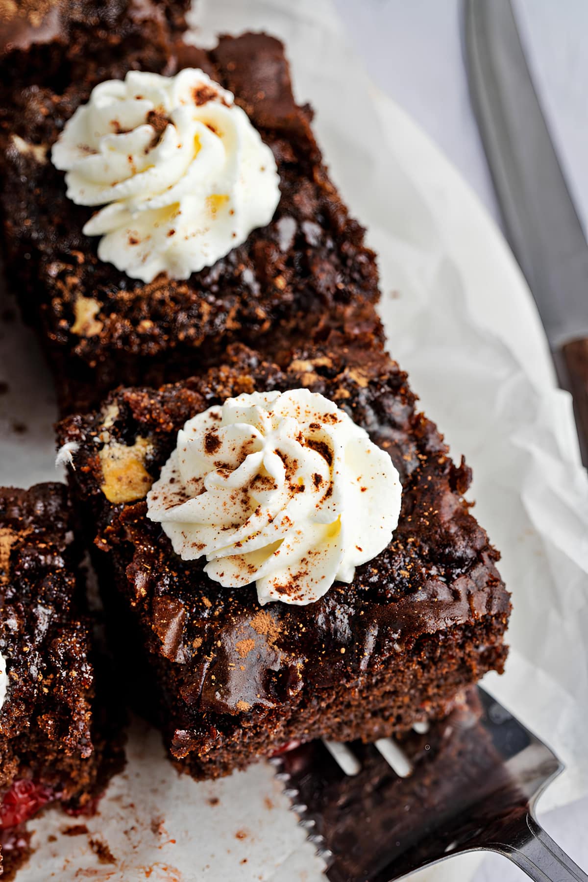 Homemade Decadent Chocolate Dream Cake with Cherries and Whipped Cream