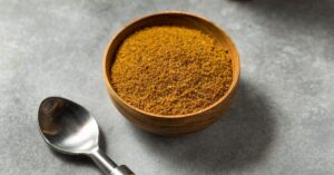 Raw Organic Old Bay Seasoning in a Wooden Bowl