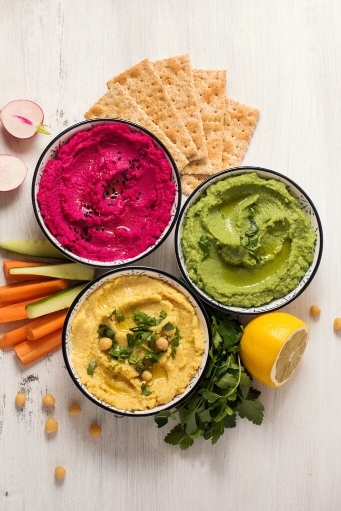 Various Hummus Vegetarian Dips Including Beetroot and Spinach